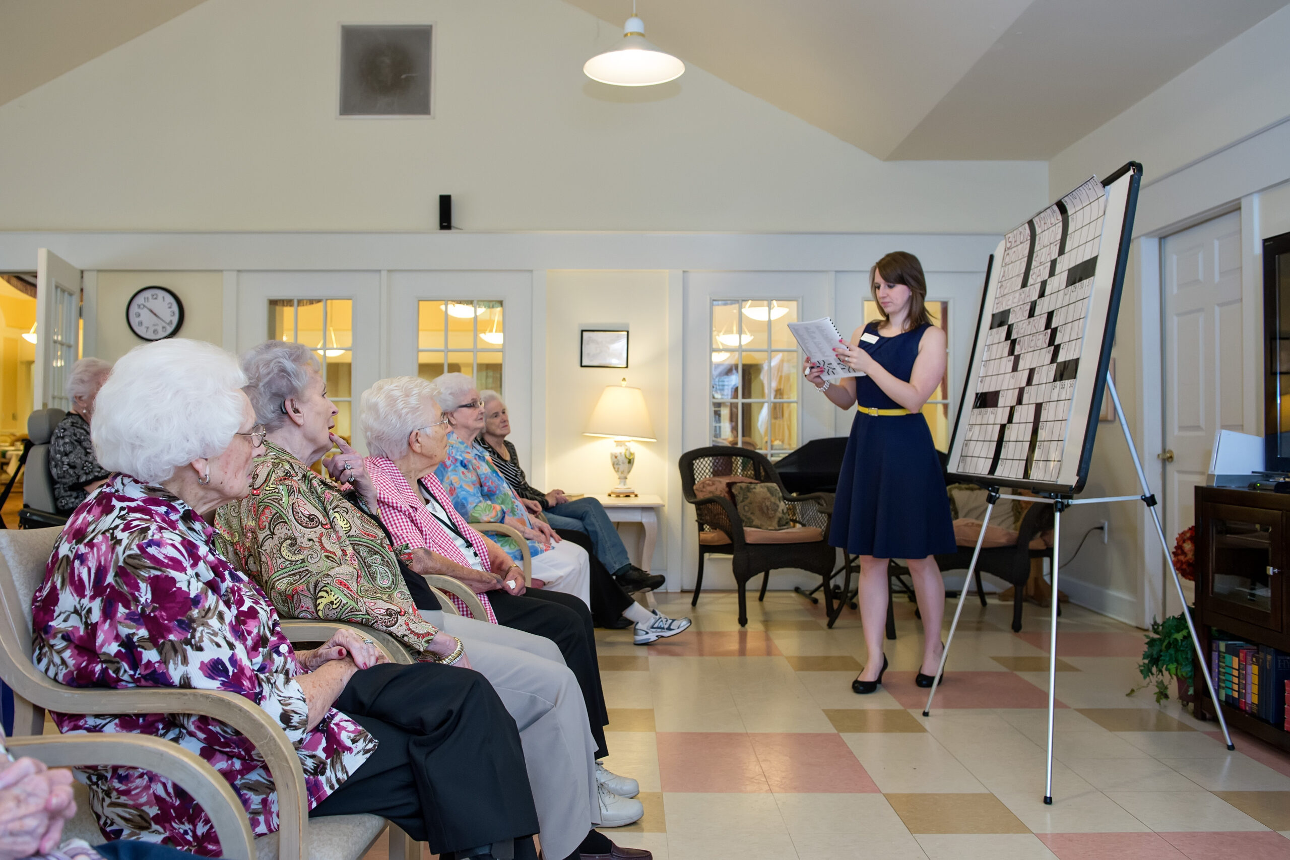 A resident working on a crossword puzzle — brain fitness daily