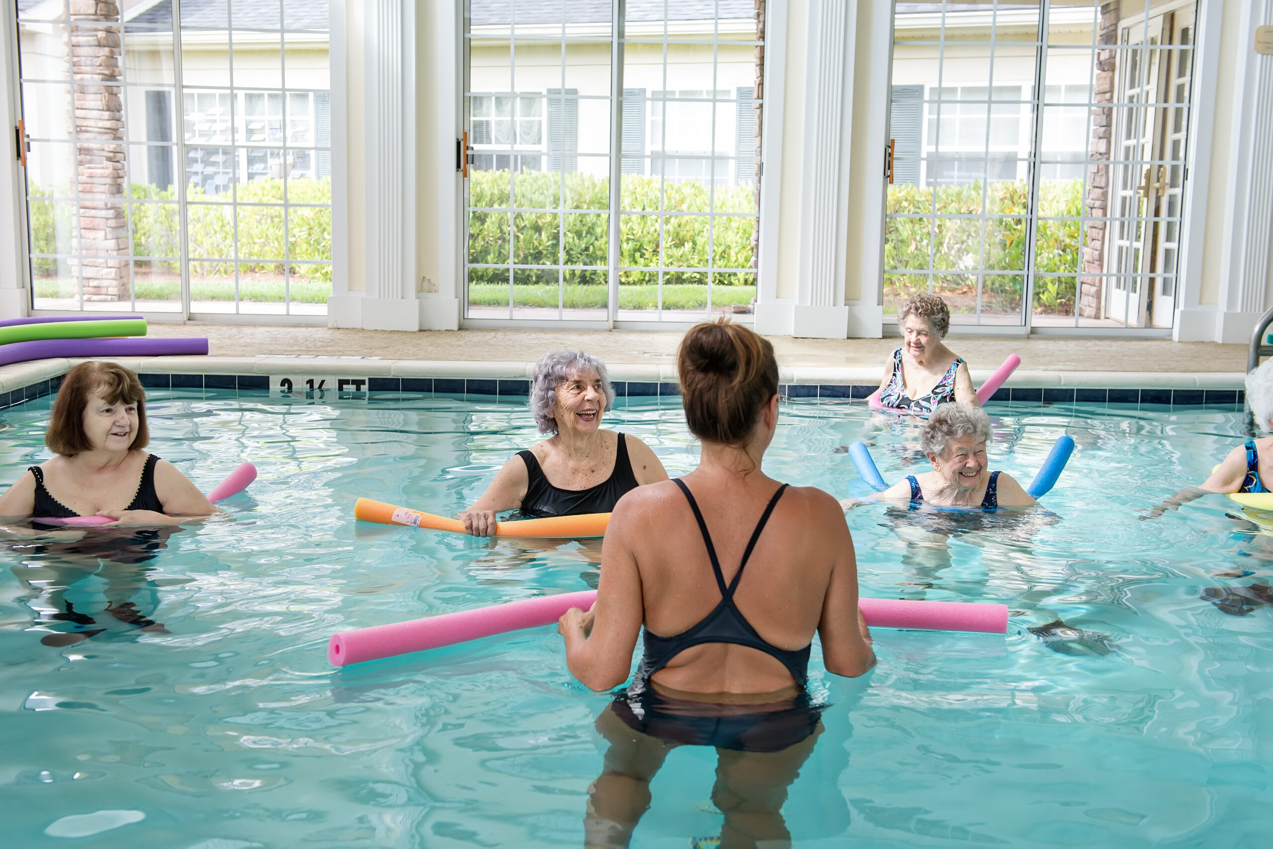 Water aerobics class in our heated indoor saltwater pool